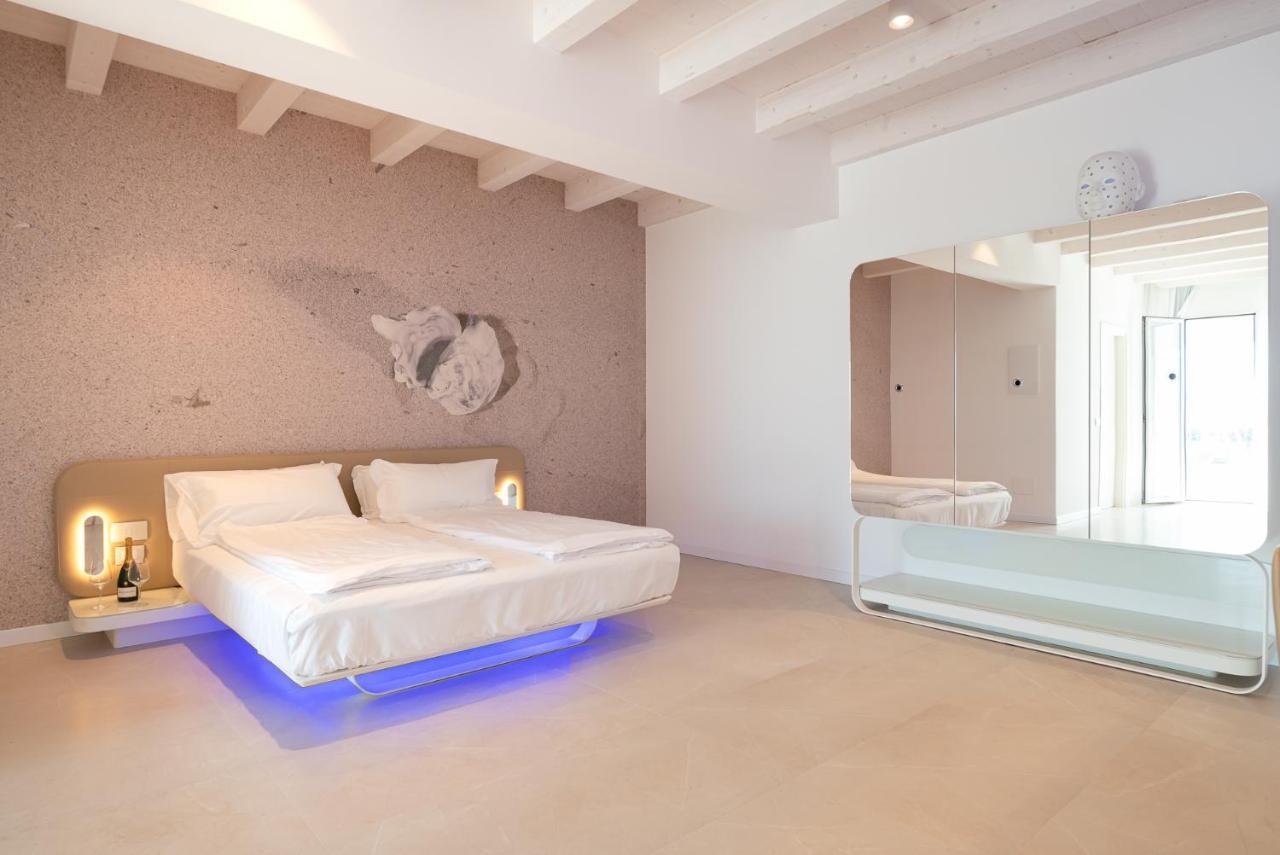 Unico Hotel Caorle Bagian luar foto